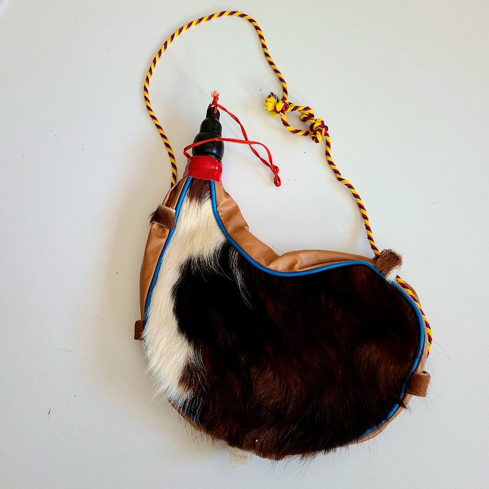 Decorative Bota bag with cow fur.